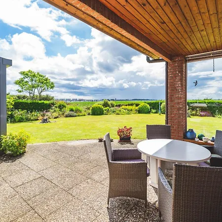 Апартаменты Huus Binnensee - Erdgeschoss-wohnung Mit Garten & Seeblick - Wintergarten & Terrasse - Hundefreundlich - Ruhige Lage - Suedstrand 5 Min Mit Rad *