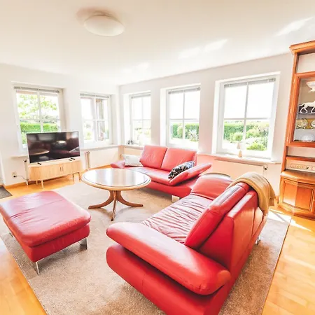 Apartment Huus Binnensee - Erdgeschoss-Wohnung Mit Garten & Seeblick - Wintergarten & Terrasse - Hundefreundlich - Ruhige Lage - Suedstrand 5 Min Mit Rad Fehmarn