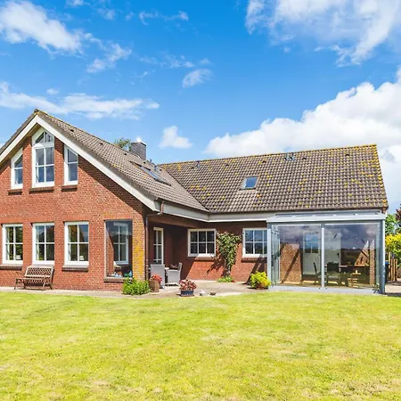 Апартаменты Huus Binnensee - Erdgeschoss-wohnung Mit Garten & Seeblick - Wintergarten & Terrasse - Hundefreundlich - Ruhige Lage - Suedstrand 5 Min Mit Rad *