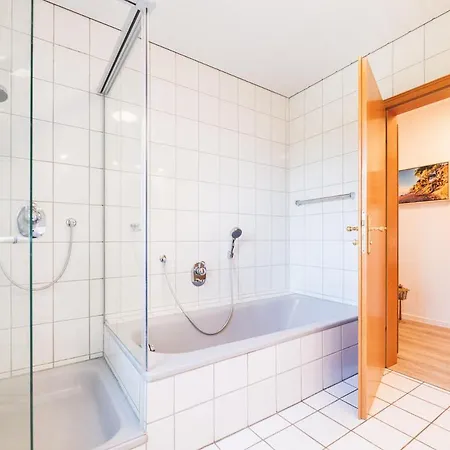 Апартаменты Huus Binnensee - Erdgeschoss-wohnung Mit Garten & Seeblick - Wintergarten & Terrasse - Hundefreundlich - Ruhige Lage - Suedstrand 5 Min Mit Rad Фемарн