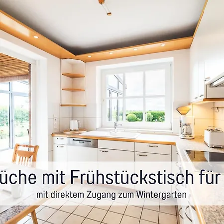 Huus Binnensee - Erdgeschoss-wohnung Mit Garten & Seeblick - Wintergarten & Terrasse - Hundefreundlich - Ruhige Lage - Suedstrand 5 Min Mit Rad Fehmarn