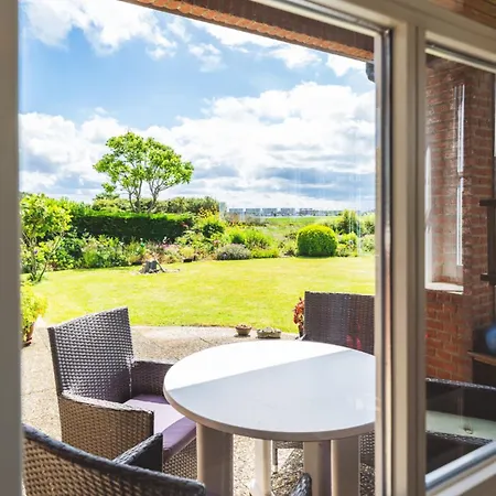 Apartment Huus Binnensee - Erdgeschoss-wohnung Mit Garten & Seeblick - Wintergarten & Terrasse - Hundefreundlich - Ruhige Lage - Suedstrand 5 Min Mit Rad *