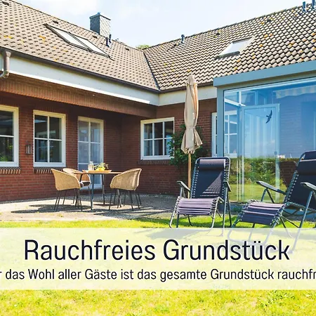 公寓 Huus Binnensee - Erdgeschoss-wohnung Mit Garten & Seeblick - Wintergarten & Terrasse - Hundefreundlich - Ruhige Lage - Suedstrand 5 Min Mit Rad