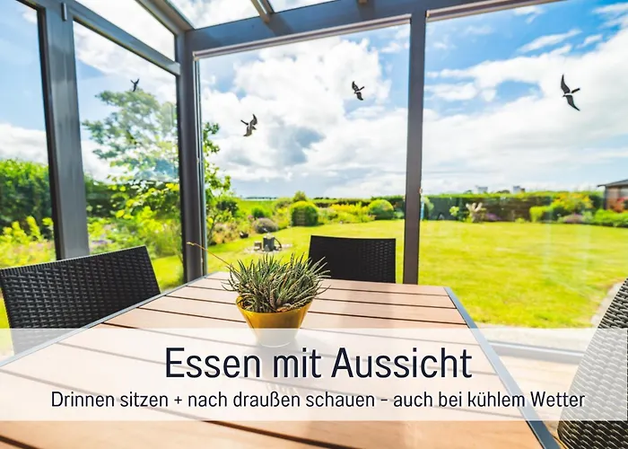 شقة Huus Binnensee - Erdgeschoss-wohnung Mit Garten & Seeblick - Wintergarten & Terrasse - Hundefreundlich - Ruhige Lage - Suedstrand 5 Min Mit Rad