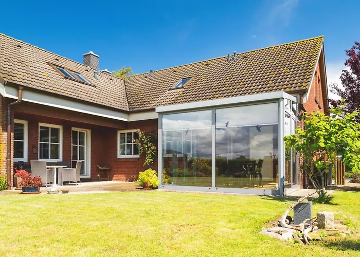 شقة Huus Binnensee - Erdgeschoss-wohnung Mit Garten & Seeblick - Wintergarten & Terrasse - Hundefreundlich - Ruhige Lage - Suedstrand 5 Min Mit Rad