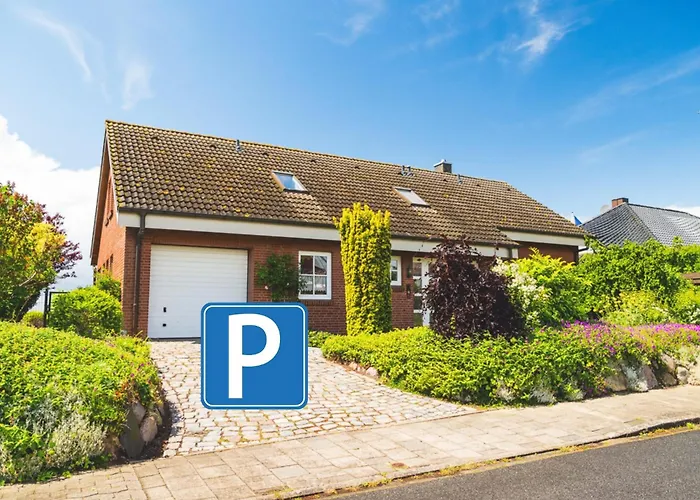 شقة Huus Binnensee - Erdgeschoss-wohnung Mit Garten & Seeblick - Wintergarten & Terrasse - Hundefreundlich - Ruhige Lage - Suedstrand 5 Min Mit Rad فيهمارن